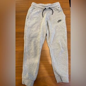 Boys medium Nike Tech joggers.